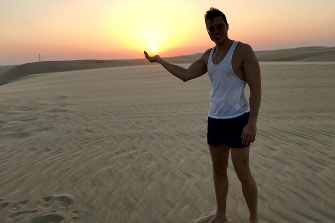 4 Hour Desert Safari, Camel Ride & Inland Sea Beach - Camel ride and falcon photo stops, fun factor with an ethical lens