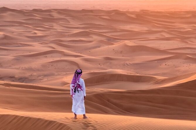 4hr Desert Safari: Sunset,Sunrise,Camel,Sand boarding,Inland Sea - Dune bashing and sandboarding at the highest dunes, with Paragliding nearby
