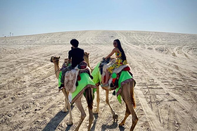Camel trekking on the Dunes with Sunset - Sealine Beach hour: camels, falcon photos, and Bedouin tea