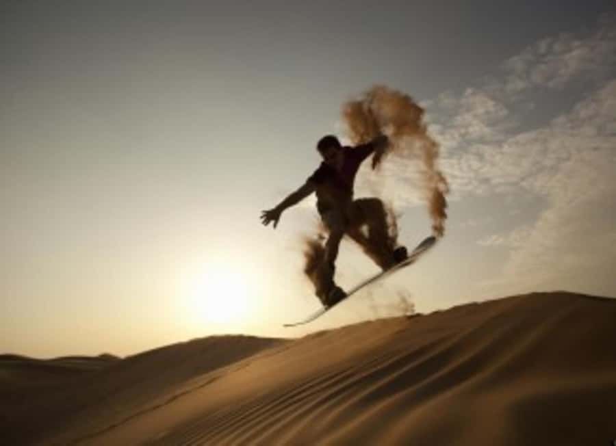 Desert Safari, Quad Bike, Camel Ride, Falcon & Sandboarding - Sandboarding from the highest dunes