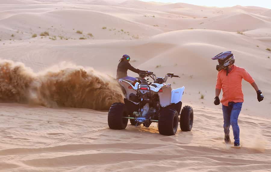 Desert Safari Self-Drive Quad Bike OR Dune Buggy Experience - Sealine Beach Resort: camel ride, falcon-style moment, and a reset
