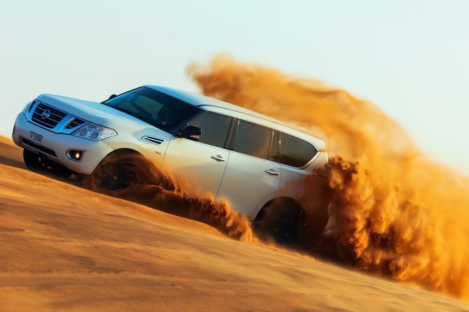 Desert Safari with Camel Ride, Sand Boarding & Inland Sea Tour in Doha - Getting to the desert: pickup, meeting point, and how your ride works