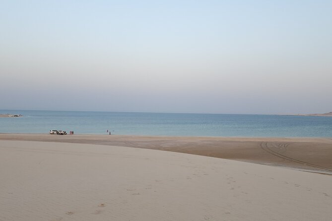 Desert Safari with Sandboarding and Inland Sea Private Tour - Sealine Beach stop: tea, views, and a camel option