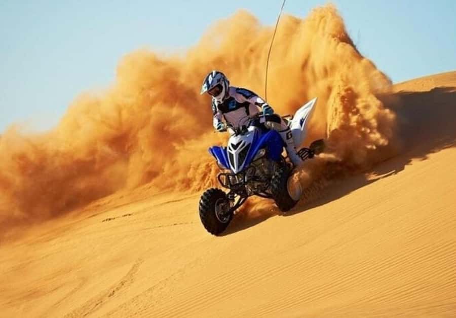 Doha:ATV,Quad or Buggy Dune Bashing,CamelRide & Sandboarding - Doha Desert Safari, ATV/Quad Dune Bashing, Camel Ride, Sandboarding: The Real Deal