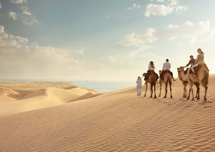 Doha:ATV,Quad or Buggy Dune Bashing,CamelRide & Sandboarding - Tea, Photos, Camel Ride, and Camp-Style Break Time