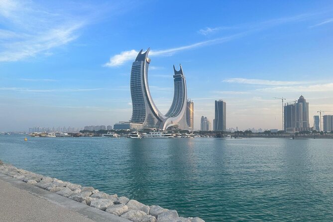 Doha Combo a Rich Heritage from the Desert to the City - Start at Khor Al Udaid Beach, where the desert turns dramatic