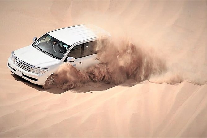Doha Combo City And Half Day Desert Safari Tour No Hidden cost - Desert Thrills: Camel Ride, Sandboarding, and Dune Bashing
