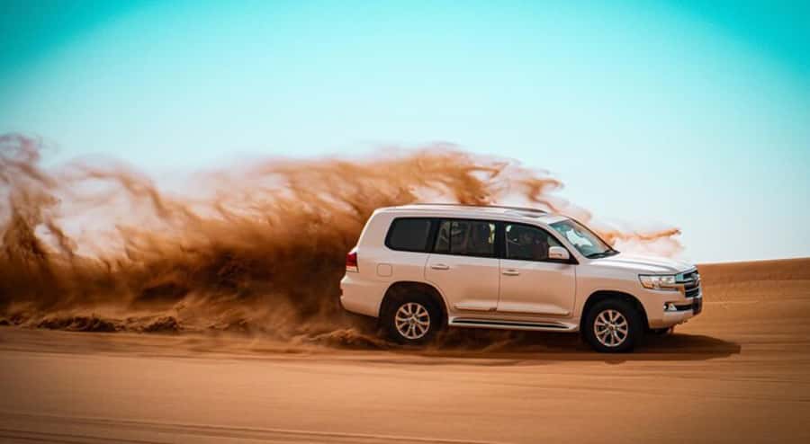 Doha: Desert All Activities ATV Quad Bike, Dune Bashing - Mesaieed sandboarding: the sliding part that many people remember most