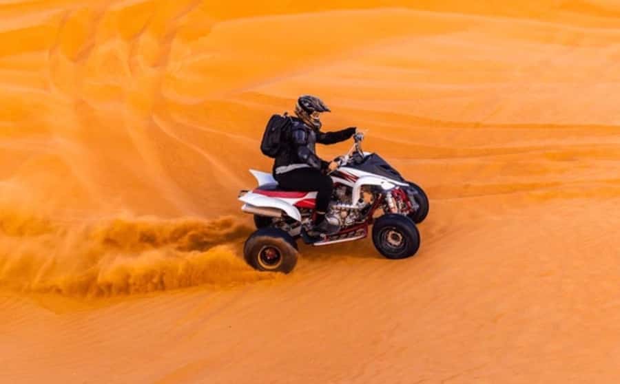 Doha: Desert All Activities ATV Quad Bike, Dune Bashing - Inland Sea Beach: dune bashing, walking time, and border views