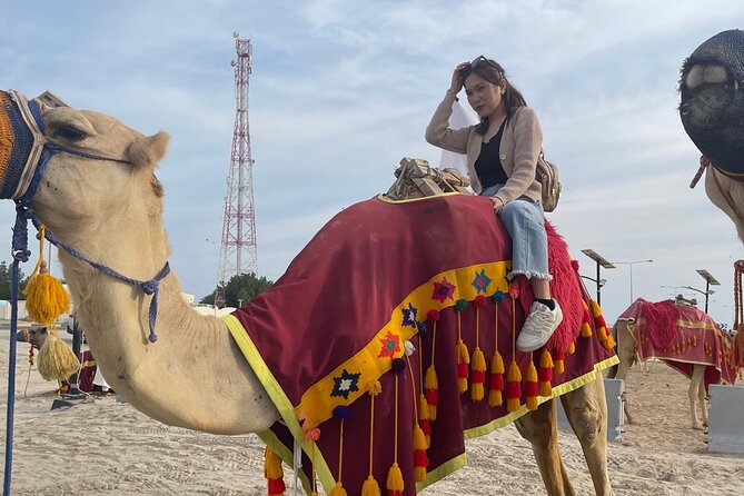 Doha Desert Safari Camel Ride Dune Bashing and ATV Bike - ATV biking and sandboarding: turning dunes into a playground