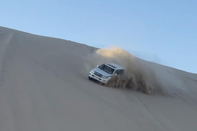 Doha Desert Safari Dune Bashing Camel Ride - Inland Sea (Khor Al Adaid): the rare “desert meets sea” payoff