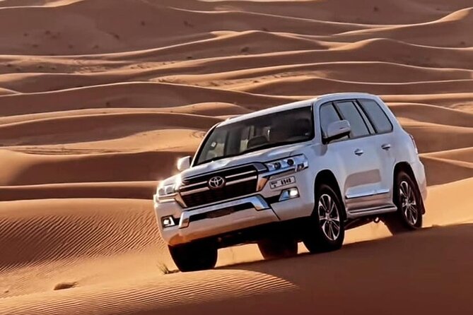 Doha: Desert Safari: Dune Bashing, Quad Bikes & Camel Rides - Sealine Beach stop: quad bike time, tea and coffee