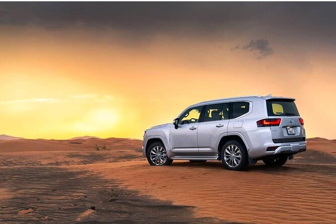 Doha: Desert Safari: Dune Bashing, Quad Bikes & Camel Rides - Tourist point: sandboarding, dune bashing, and the classic thrill factor