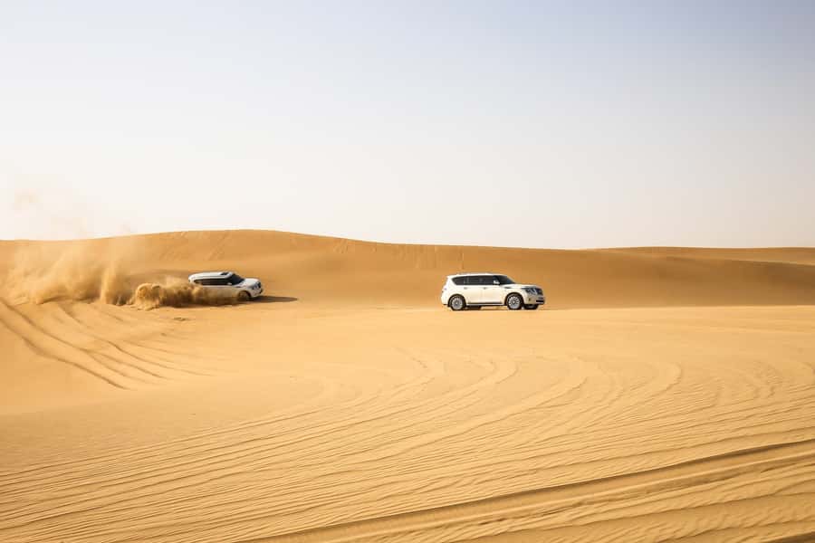 Doha: Desert Safari Dune Bashing, Sandboarding, & Camel Ride - Optional sandboarding: free if you want the extra challenge