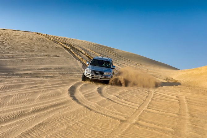 Doha Desert Safari: Dunebashing, Camel, Sandboarding & Inland Sea - The Inland Sea stop: why it is more than a random scenic add-on