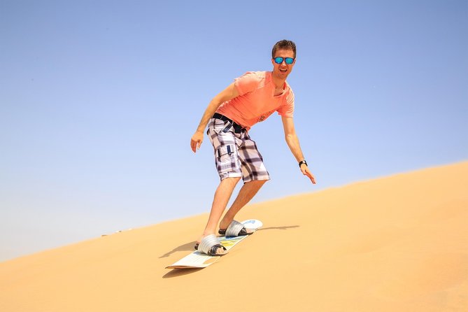 Doha Desert Safari: Dunebashing, Camel, Sandboarding & Inland Sea - Drinks, local tea, and what keeps people happy during the ride