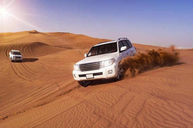 Doha: Desert Safari With Quad bike ,Camel Ride And Sand Boarding - Singing sand dunes and dune bashing, the main event