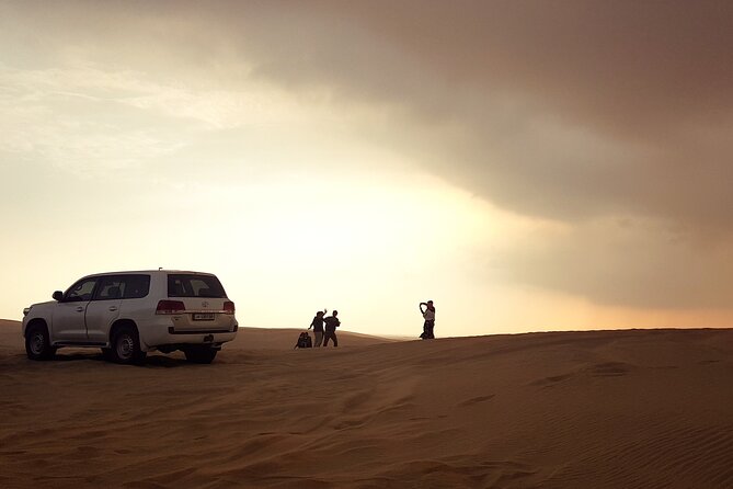 Doha: Desert Safari With Quad bike ,Camel Ride And Sand Boarding - Quad biking and sandboarding: adrenaline, with clear rules