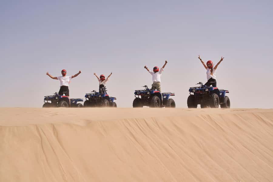 Doha: Desert Safari with Quad Bike, Sandboard & Camel Ride - Camel and Falcon Encounters, Plus a Short Camel Ride Option