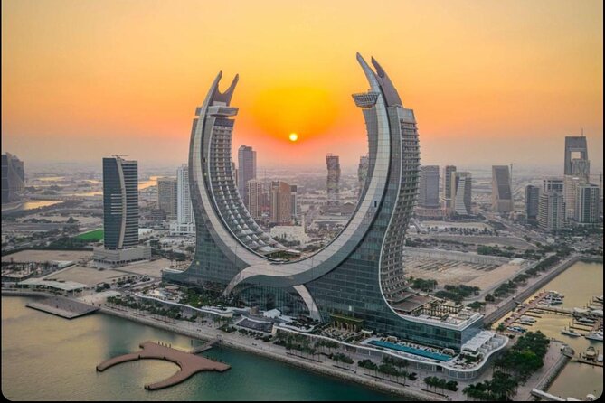 Doha: Half Day City Tour with Pickup and Drop-off - Old Port, dhow harbour, and Corniche Road in one guided hour