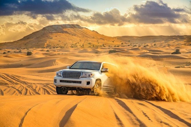 Doha :Half Day Desert Safari | Camel Riding | ATV | Sand Surfing - Getting out of Doha: from pickup to Sealine Beach tea and camels