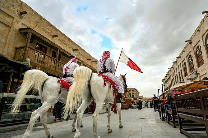 Doha Highlights Guided Tour With Dhow Cruise - Doha in 4 to 5 hours, souqs to sea views