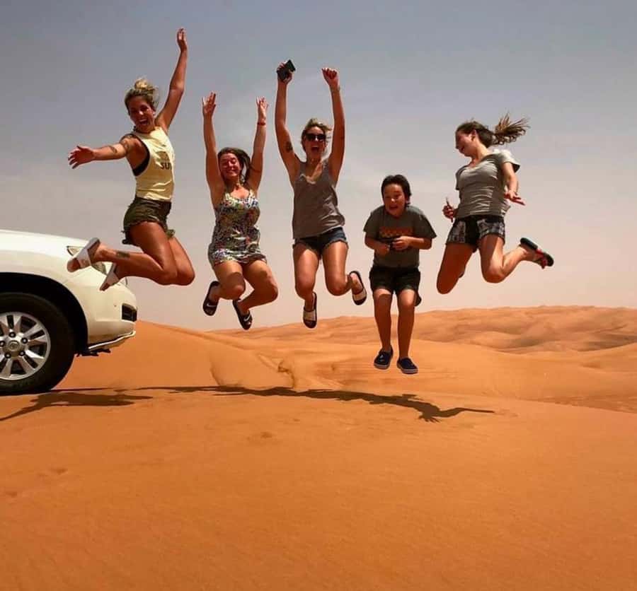 Doha: Inland Sea Desert Safari with Sunset & Sunrise Views - Inland Sea Beach and Khor al Adaid: The Golden Hour Centerpiece