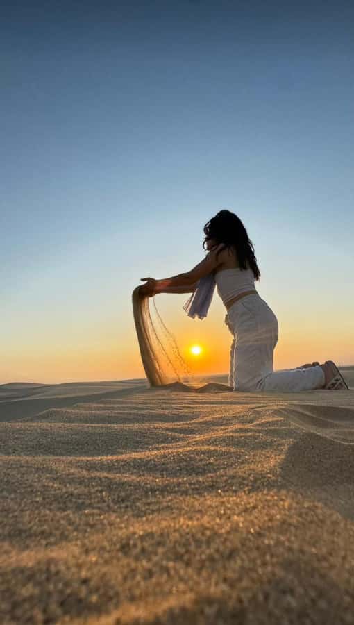 Doha: inland sea Tour With Dune Bashing &Sandboarding fun - Sealing Beach break: camel time, a swim option, and photo opportunities