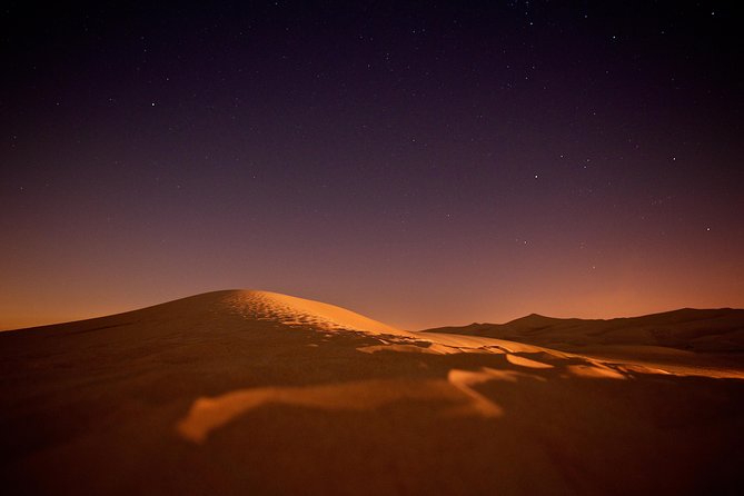 Doha Night Desert Safari Camel Ride Dune Bashing with Transfer - Inland Sea stop near Khor Al Udaid: sea-meets-sand calm