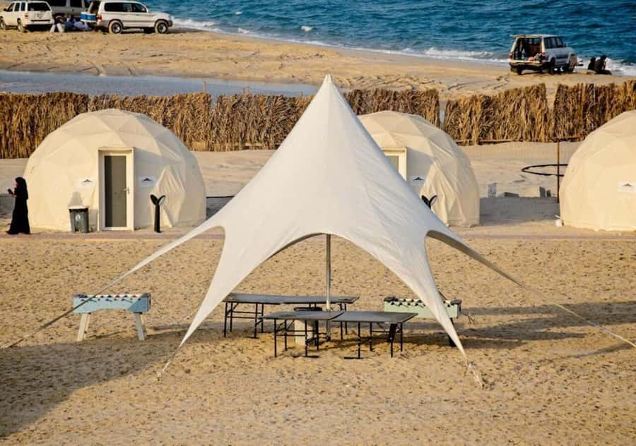 Doha: Overnight Desert Camping With BBQ Dinner & Breakfast - Back to the dunes: dune bashing, quad biking options, and desert energy