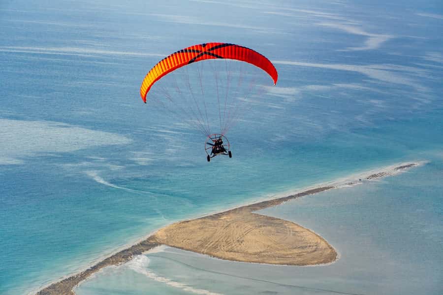 Doha: Paratrike Air Tour with Hotel Pickup and Drop-off - Hotel pickup and the 4x4 air-conditioned ride, why that matters in Qatar