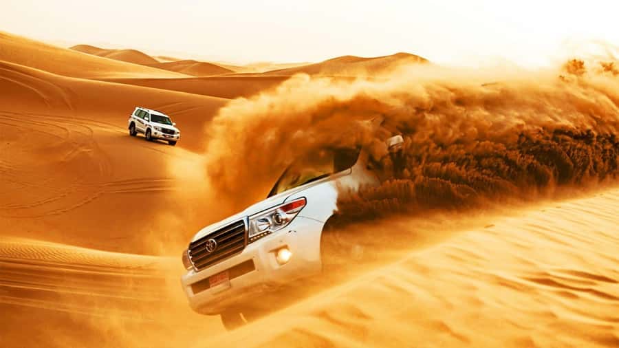 Doha : Private Desert Safari With Camel Ride & Sand Boarding - Sandboarding and Dune Bashing by 4x4: What the 105 Minutes Are Like