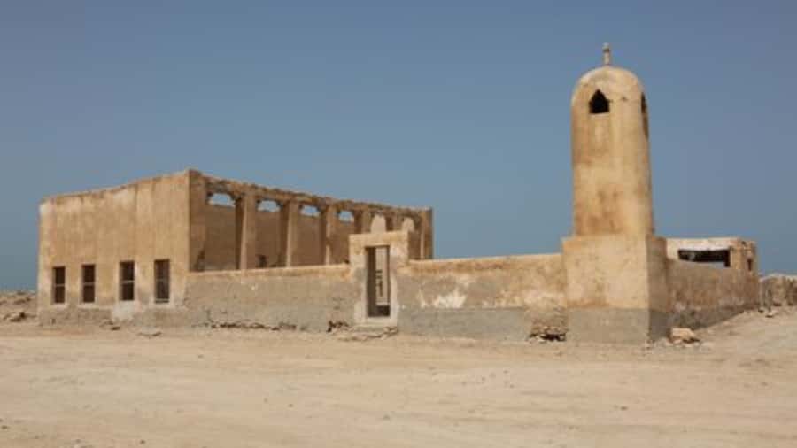 Doha: Private North Qatar Tour, Mangroves, & Zubara Fort - Jumail abandoned village, photo stops with an Alkubaisi thread
