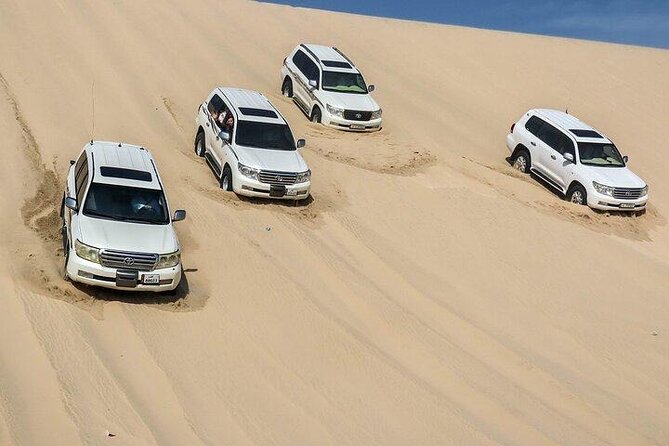 Doha Qatar ATV Quad Bike Buggy Desert Adventure and Camel Ride - Tea, camel ride, and desert calm: the gentle break that makes the day work