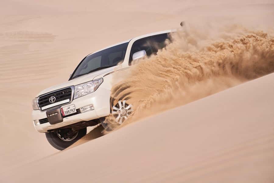 Doha: Safari, Camel Ride, Sandboarding and Inland Sea Tour - Sandboarding: The included activity that feels surprisingly easy to enjoy