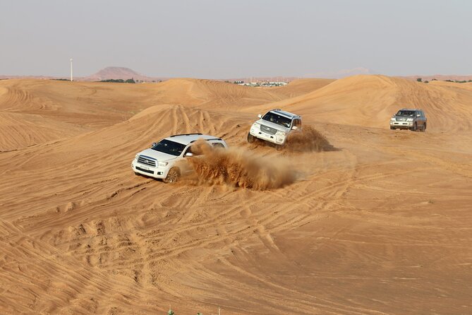 Doha Sharing Desert Safari with Dune Bashing and Sand Boarding - Getting out of Doha: pickup, ride time, and why the group size matters