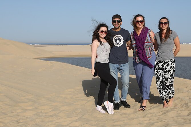 Doha; Sunrise Desert Tour and camel safari 4hrs - Seaside moments: tea, camel riding, and a falcon exposure stop