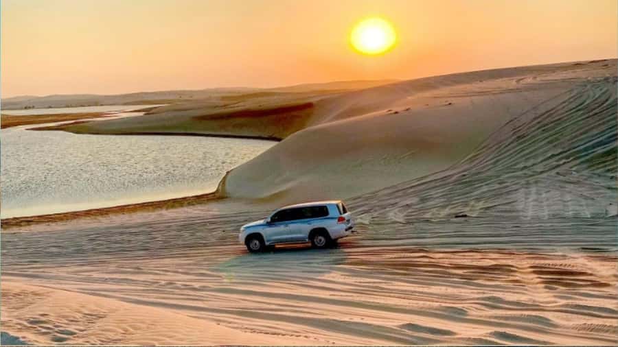 Doha :Sunrise/ Sunset Desert Safari CamelRide & Sandboarding - Why the Inland Sea sunrise or sunset timing matters so much