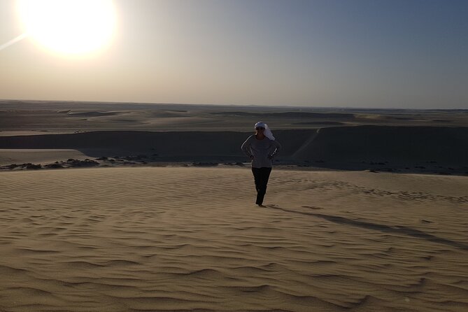 Doha: Sunrise /Sunset Desert Safari with Sand Boarding,Camel ride - Sand boarding: the included activity you should not skip