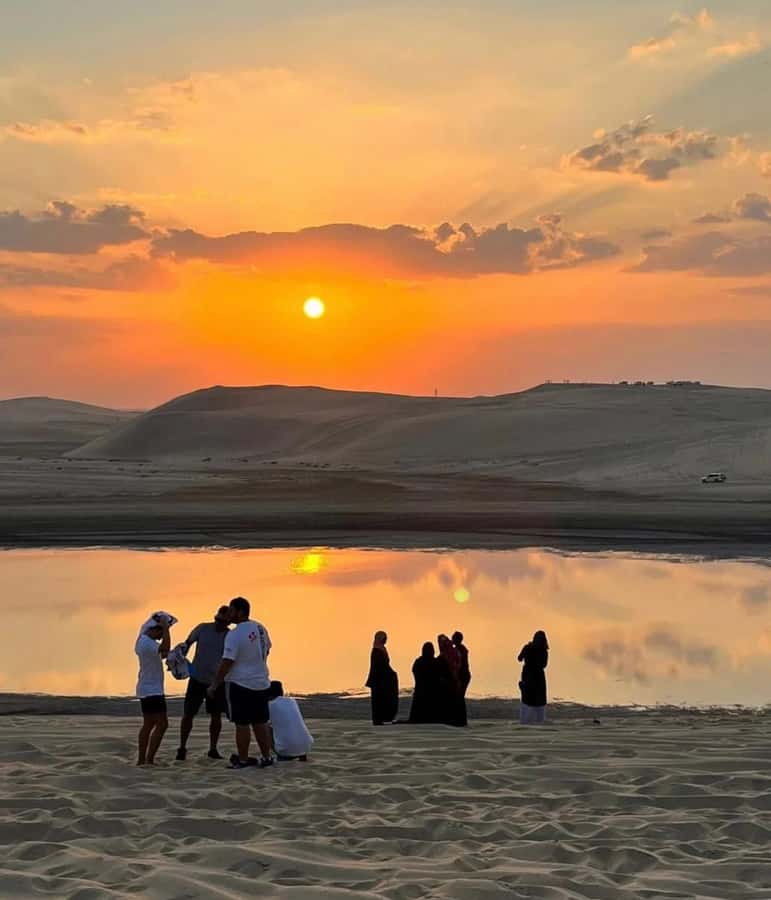 Doha: Sunset Desert Safari with Camel Ride & Sandboarding - Inland Sea Sunset Stop for Big-View Photos