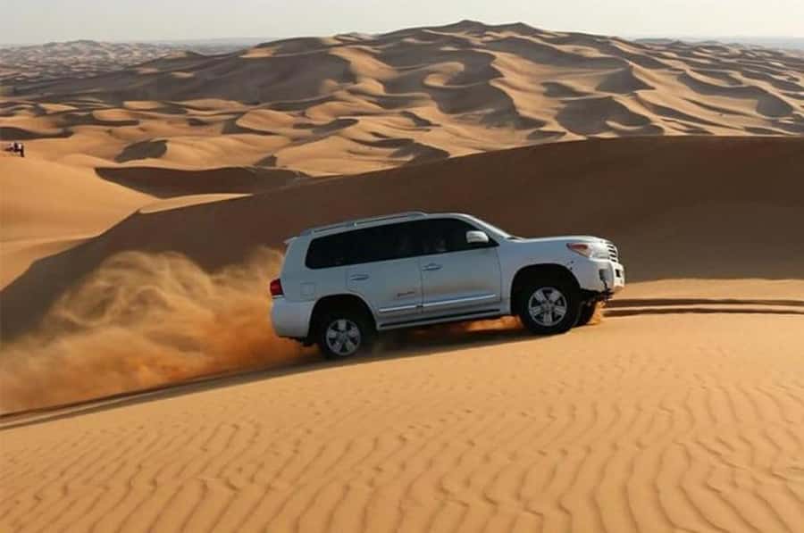 Dune Bashing &Beyond The Ultimate Desert Safari From Doha - Red dune bashing and sandboarding, the part you will remember