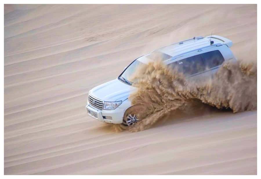 Dune Bashing, Sandboarding, Camel Ride & Optional ATV Ride - Camel Camp Time: Shoet Camel Ride, Tea, and a Desert Border Feel