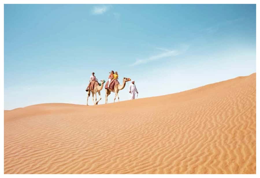 Dune Bashing, Sandboarding, Camel Ride & Optional ATV Ride - Sandboarding on Real Dunes: Speed, Balance, and Short Runs