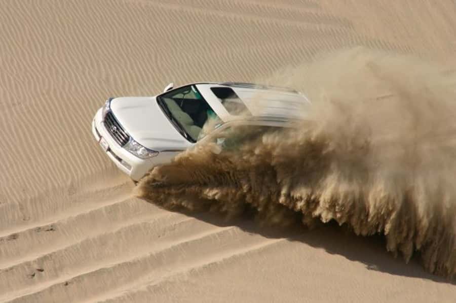 Dune Bashing, Sandboarding, Camel Ride & Optional ATV Ride - Optional ATV Ride: Track Racing for the Speed Crowd