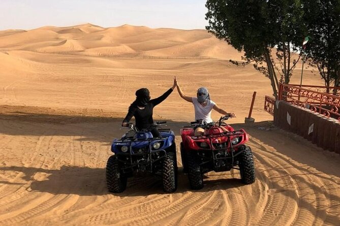 DuneBashing, CamelRide & ATV Bike Desert Safari Experince in Doha - Dune bashing at Sealine Beach: tire deflation and the adrenaline factor