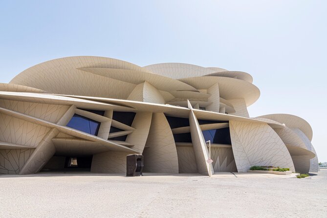 Explore Doha: City Tour & Dhow Boat Cruise Adventure - The Pearl-Qatar and Porto Arabia Boardwalk: modern waterfront in a tight time slot