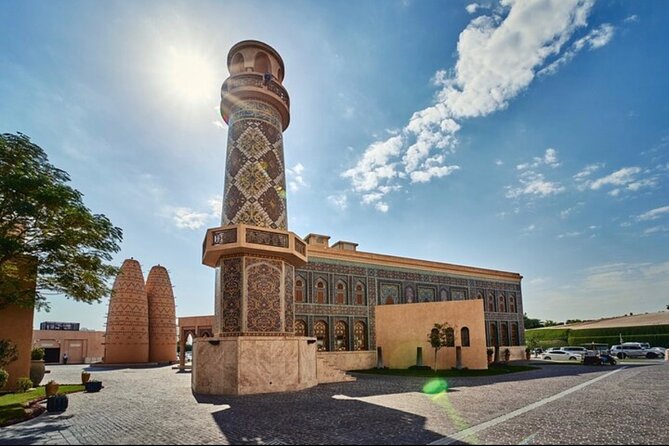 Explore Heart of Qatar Doha City Tour with Professional Guide - The Pearl-Qatar area: Porto Arabia Boardwalk and a Venice-style canal replica