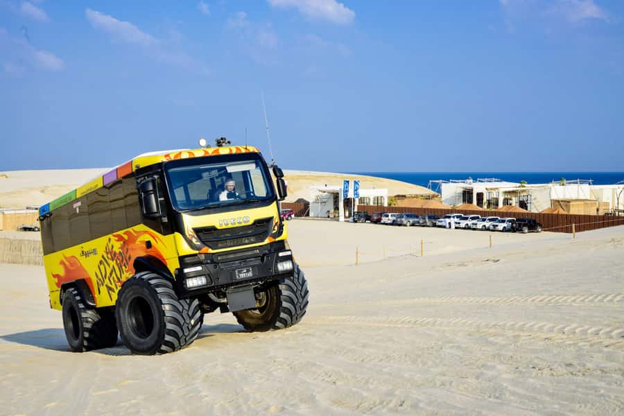 From Doha: Exclusive Monster Bus Safari Experience - Al Majles Resort: Oryx Viewing, Welcome Refreshments, and Camel Time