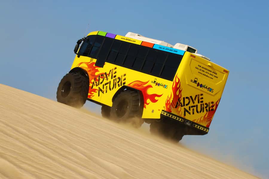 From Doha: Exclusive Monster Bus Safari Experience - From Your Doha Pickup to the Sealine Desert Dunes