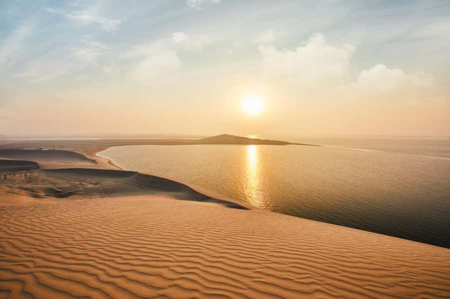 From Doha: Sunrise or Sunset Safari with Sand Boarding - Doha pickup, air-conditioned comfort, and the pace you should expect